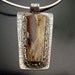 Tuscarora Petrified Wood Cab Set in Fine Silver