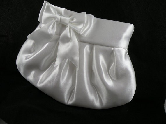 white bow clutch bag