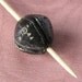 African bead-whorl support spindle
