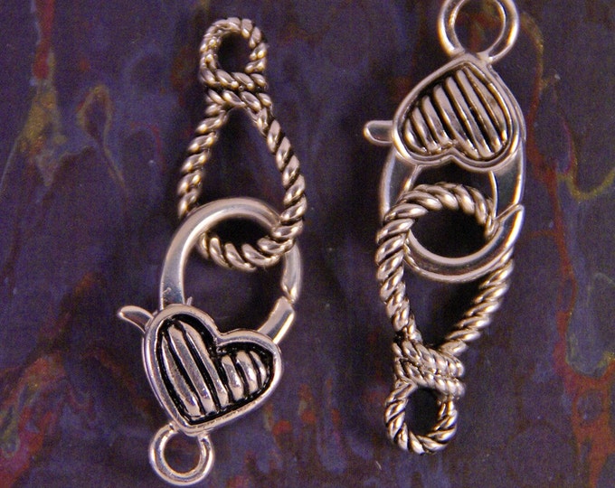 Two Silver-tone Lasso and Heart Toggle Clasps