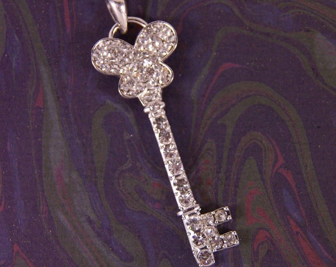 Rhinestone Skeleton Key with Butterfly Motif Top Pendant