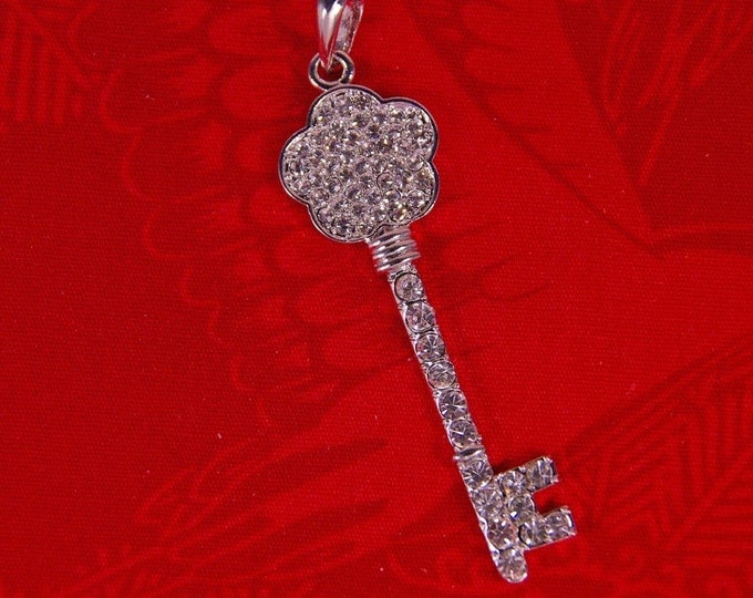 Rhinestone Encrusted Skeleton Key with Flower-shape Top Pendant