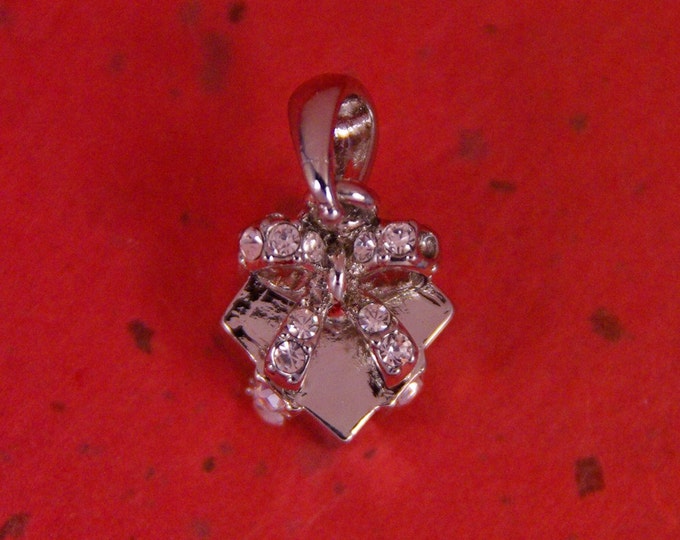 Small Silver-tone Rhinestone Accented Gift with Ribbon Pendant