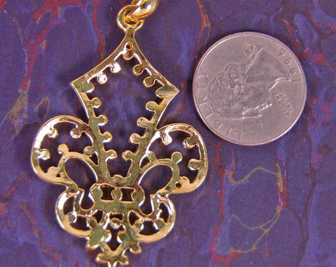 Cut Out Gold-tone Fleur de Lis Pendant with Tiny Rhinestone Accents