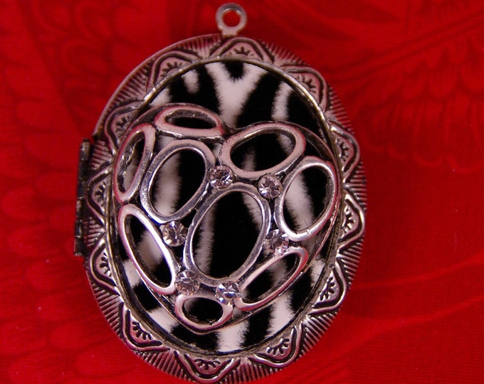 Large Antique Silver-tone Locket with Zebra Pattern Inset and Heart Cut-Out