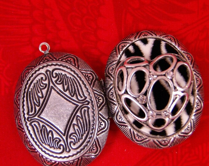 Large Antique Silver-tone Locket with Zebra Pattern Inset and Heart Cut-Out