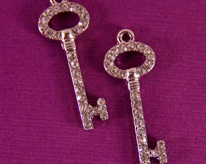 Small Pair of Rhinestone Encrusted Skeleton Key with Oval Top Charms