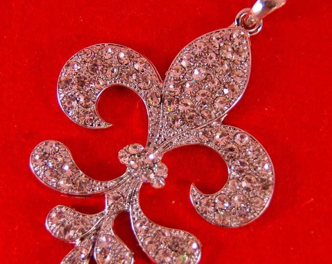 Feathery Shaped Fleur de Lis Pendant Encrusted with Rhinestones Silver-tone