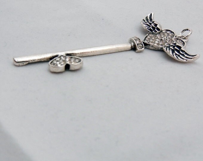 Silver-tone Skeleton Key Pendant with Winged Heart