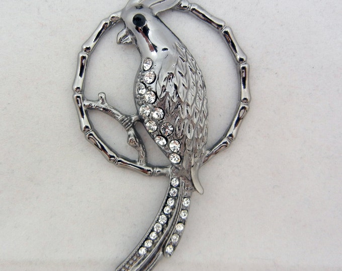 Hematite Parrot on a Round Branch Pendant with Rhinestones