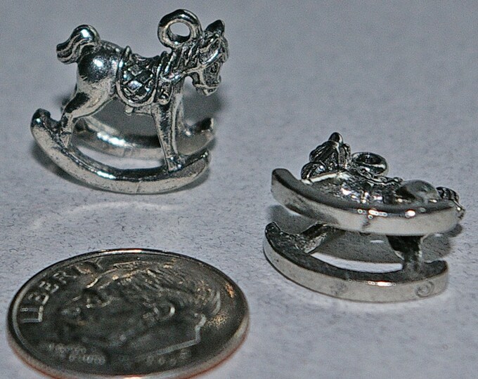 Pair of Pewter Rocking Horses