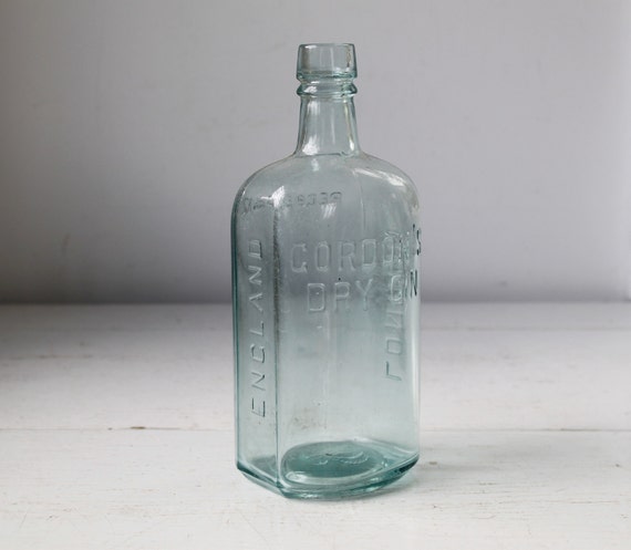 antique liquor bottle. aqua Gordon's Dry Gin. Industrial