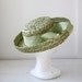 Sale / vintage 1960s green straw hat / raffia crochet, wide brim / pale emerald / the SPRING PEAS garden hat