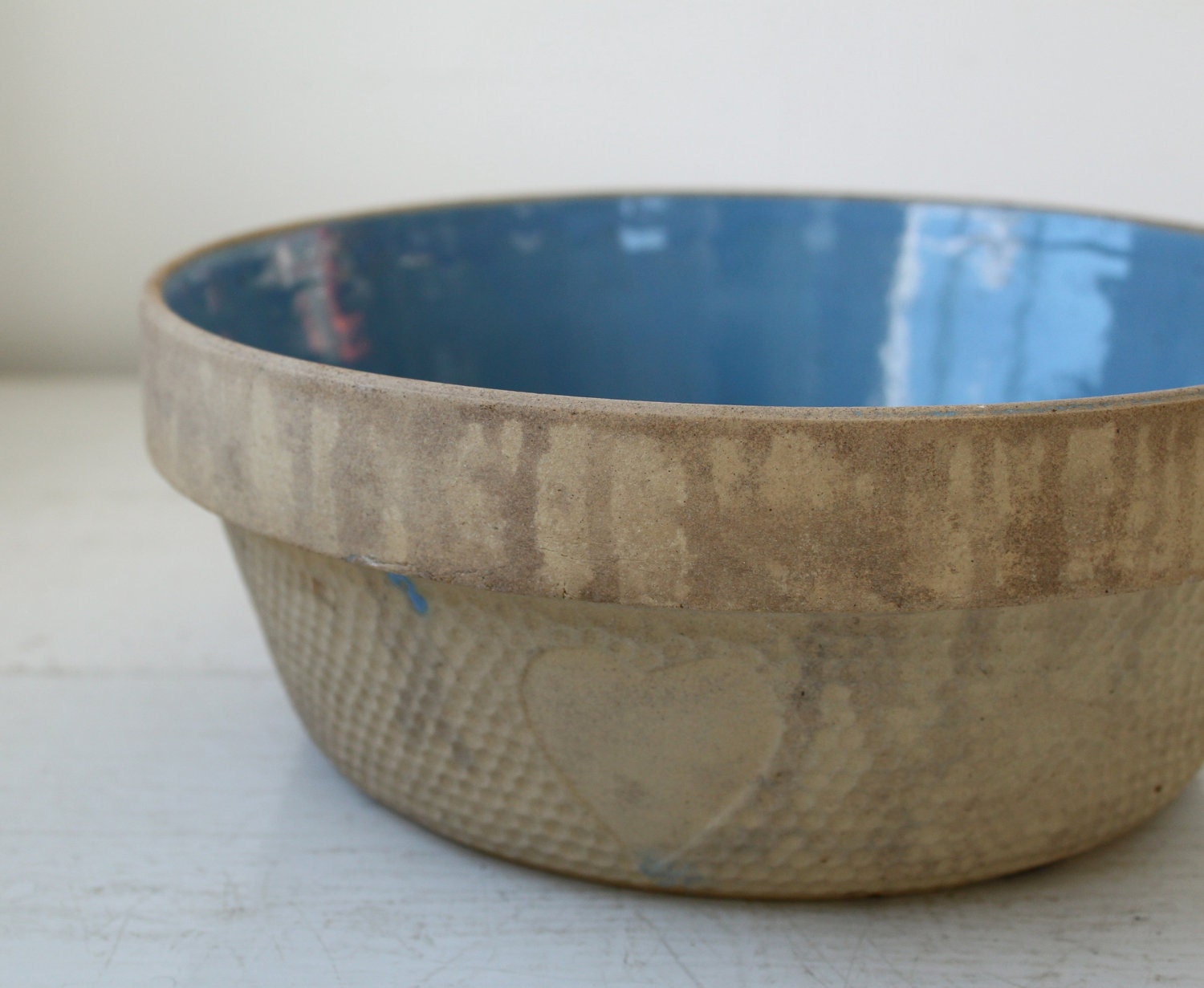 antique pottery bowl decorated with hearts. Lowry potters