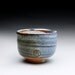 ceramic cup, tea bowl with orange shino and blue/green wood ash glazes