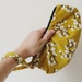 Cotton Breezes. Sweet zipper wristlet in mustard and white