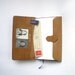 SALE - 10% off /// Handmade book with pockets. Bound in vintage leather wallet.