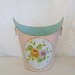 Vintage waste basket tole trash can lion heads pink and aqua with roses