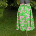 Happy vintage 70s emerald green skirt with pink piglets print.