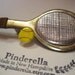 Tennis racquet and tennis ball pin