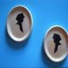 vintage pair of silhouette wall hangings