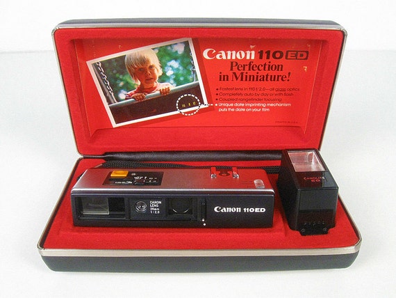 vintage Canon 110ED pocket camera with flash by ninedoorsvintage