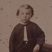 1800s Victorian tintype portrait of a young boy, ferrotype photograph.