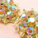 60s Rhinestone earrings, Vintage Aurora Borealis in gold setting, clip on.