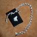 Leather pouch - recycled black leather necklace pouch with painted Arctic wolf and recycled braided yarn cords
