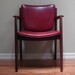 Classic wooden side chair with deep burgundy seat and back