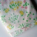 Cheerful twin flat sheet with bright flowers and green vines