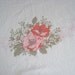 White cotton tablecloth with pink and orange flowers