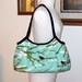 Pleated Granny Bag Made From Aviary 2 Sparrows Plum By Joel Dewberry