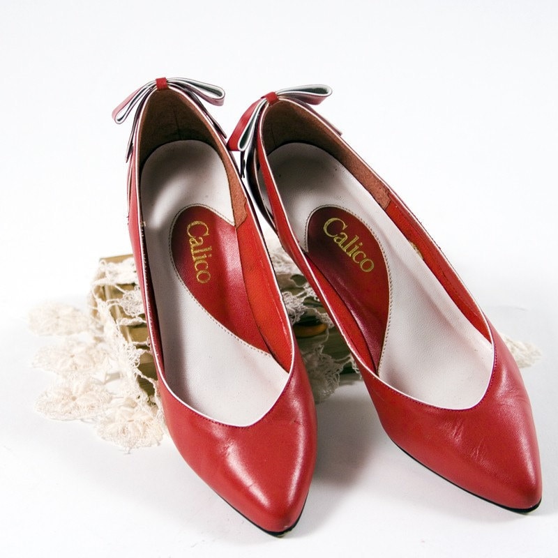 red high heel shoes with bow