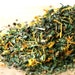 a dandelion nettle herbal tea blend . loose leaf