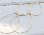 Items similar to Gold Double Hoop Earrings on Etsy