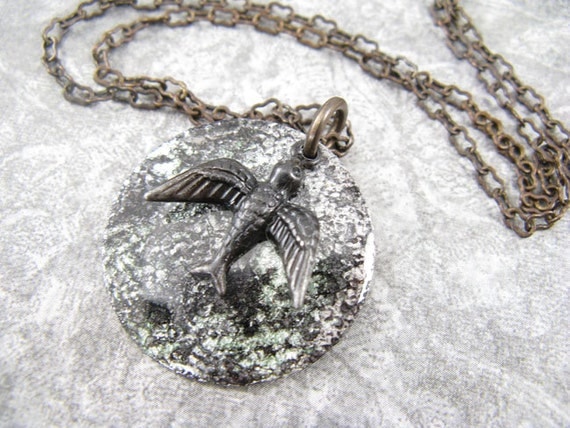 Black and silver hand painted pendant with soaring bird charm - necklace