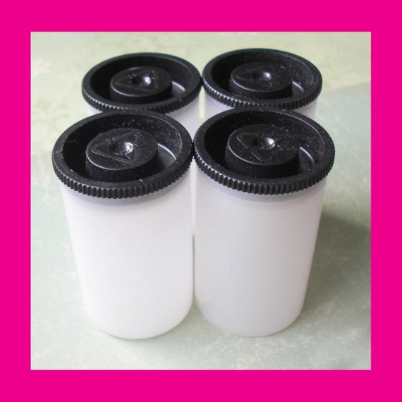 Ten Empty Film Canisters .. 10 containers with air tight lids.