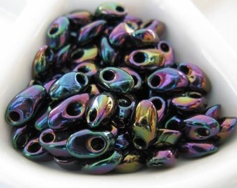Miyuki Long Magatama Beads, 4x7mm Metallic Dark Plum Iris (color LMA-454) one 8.5 Gram Tube