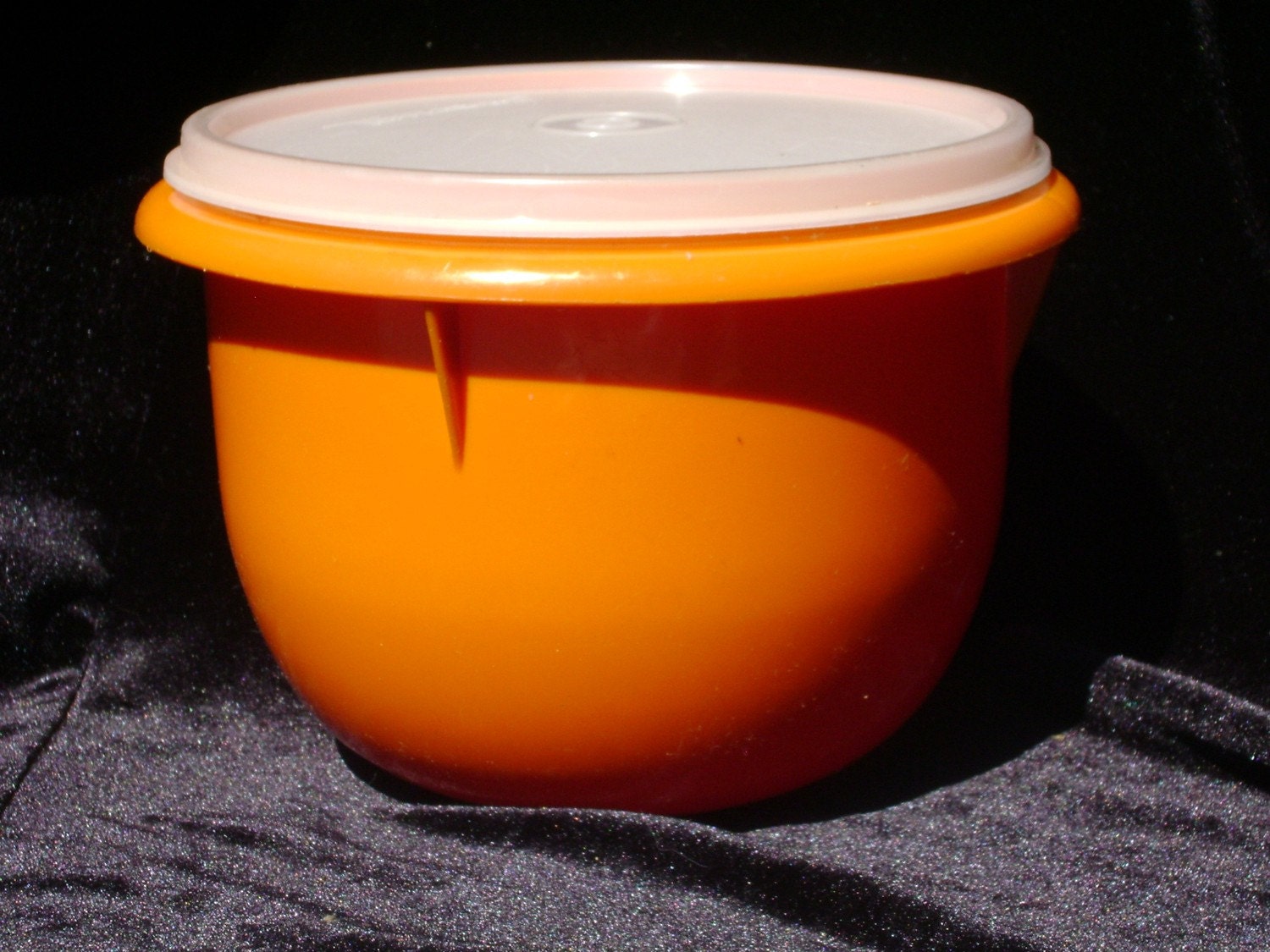 Orange Lidded Tupperware Tub