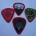 4 decorated Guitar Picks