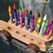 Wooden Oak School Bus and walnut wheels comes with 25 Crayons and holder for 15