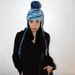Blue Pom Pom Earflap Hat