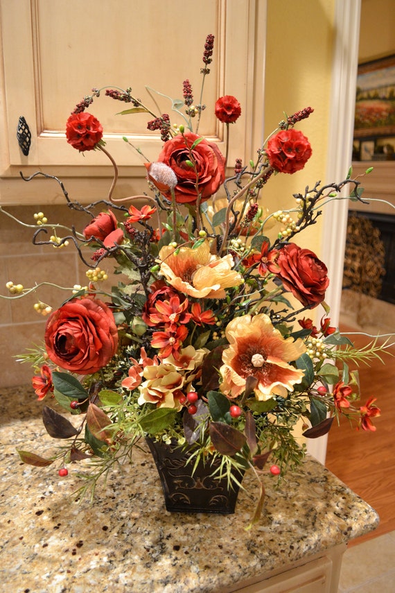 Elegant Red And Gold Floral Arrangement