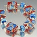 Handmade Silver Glass Lampwork Beads - red, blue, deep blue, silvered ivory - Sangre Lagoon