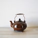 It is Tea Time--vintage royal sealy chocolate brown teapot with antique brass wire handle--art deco design