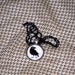Abrupt Crow glass and metal art pendant