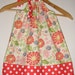 On sale normally 15.99 now 13.59 Red Tussie Mussie polka dotsJennifer Heynen and Windham Fabrics pillowcase dress (sizes small to medium)