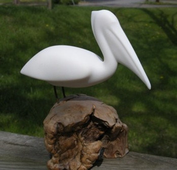 SCULPTURED WHITE PELICAN by artist John Perry