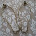 2 rusty lamp harps